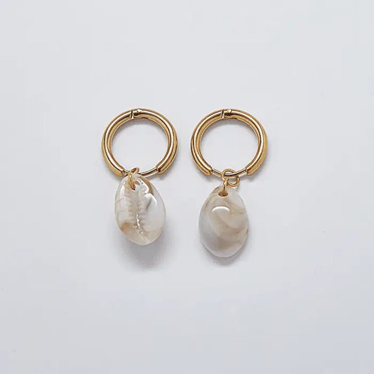 Gold huggie cowrie sea shell earrings